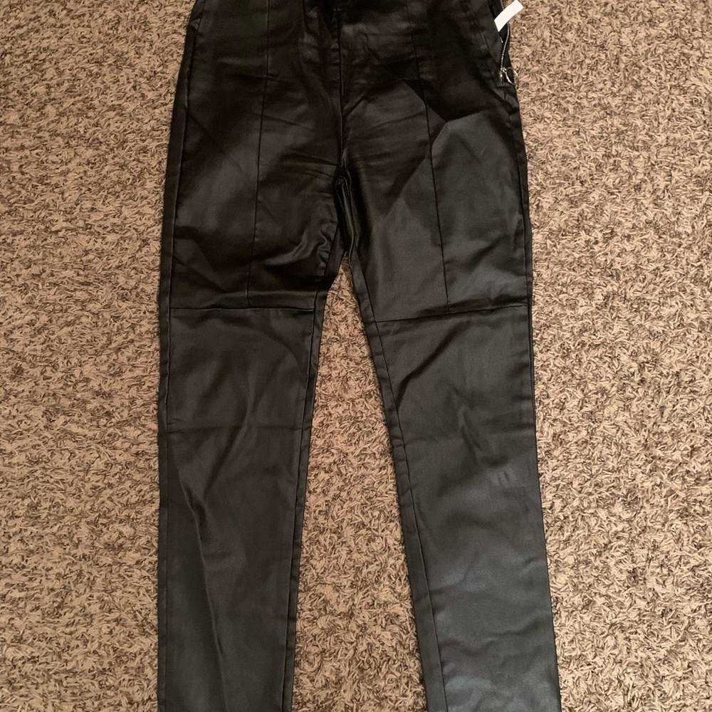 Faux leather pants. Dress them up or down.